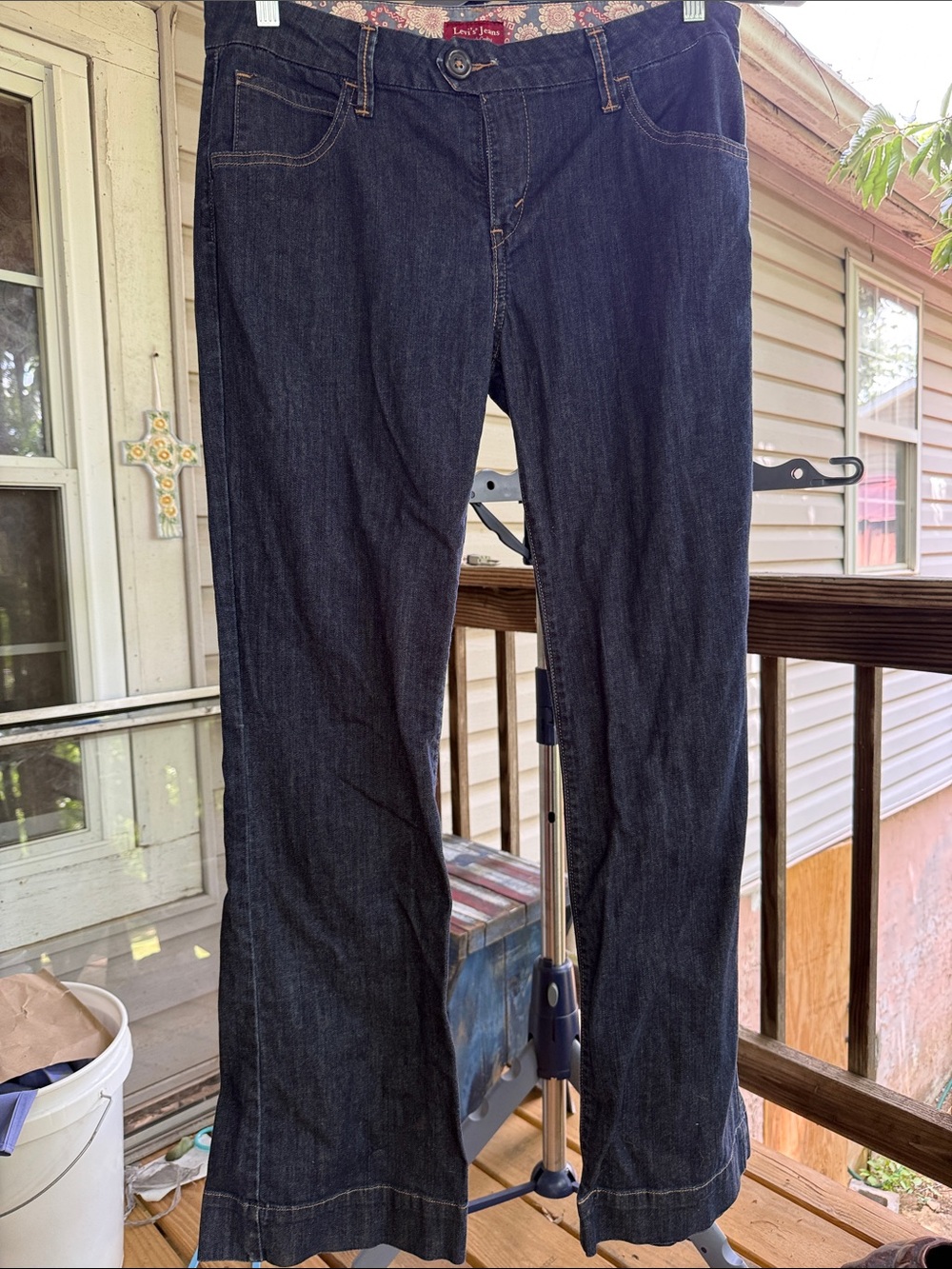 Vintage Women’s Levi’s jeans size boot leg, button pockets on back. New 42” long
